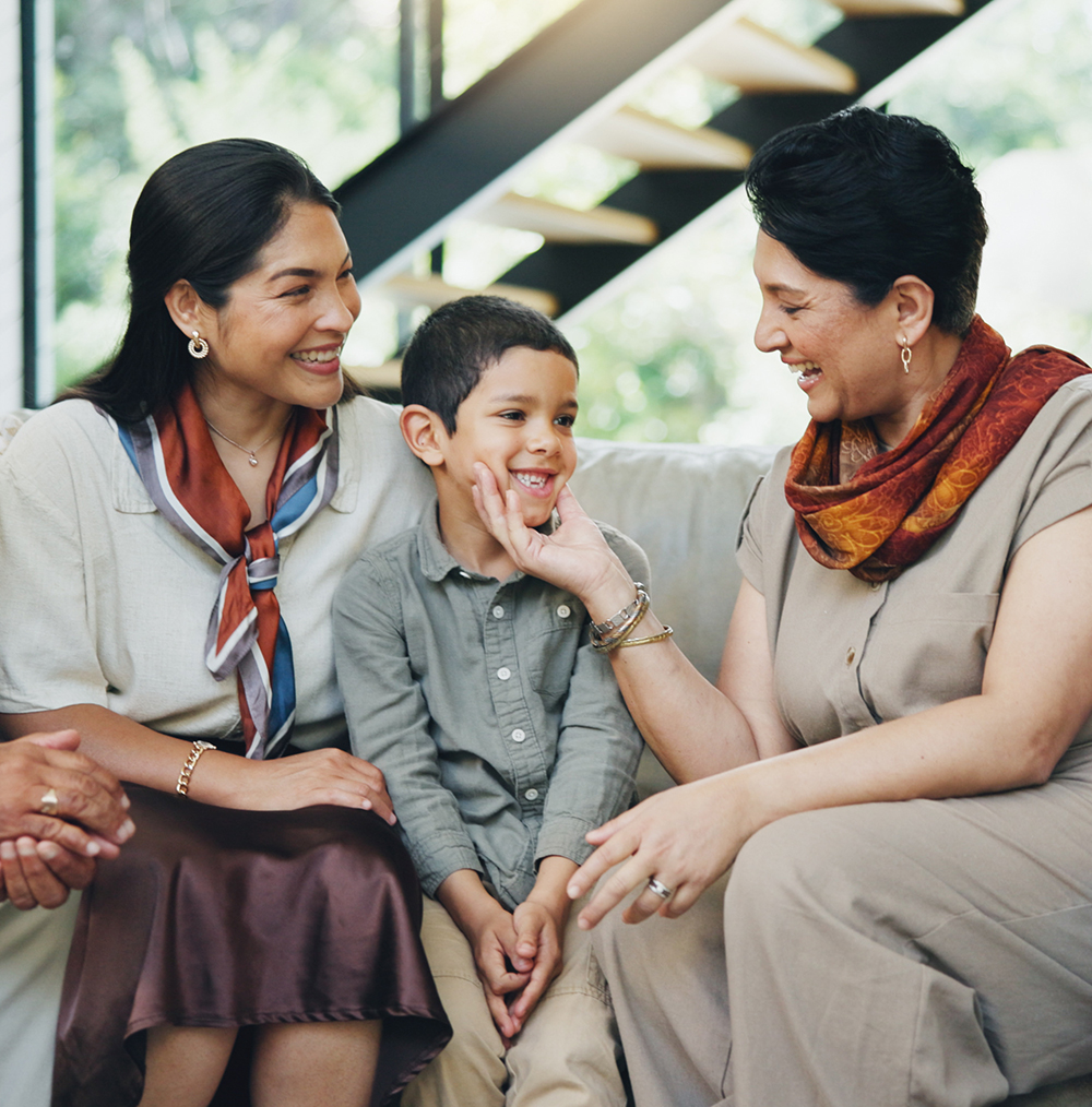 happy family on sofa at house for bonding